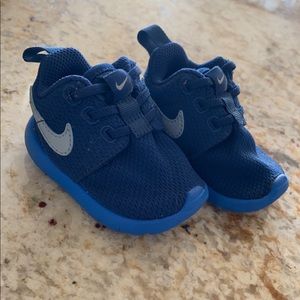 Size 2 baby Nikes.